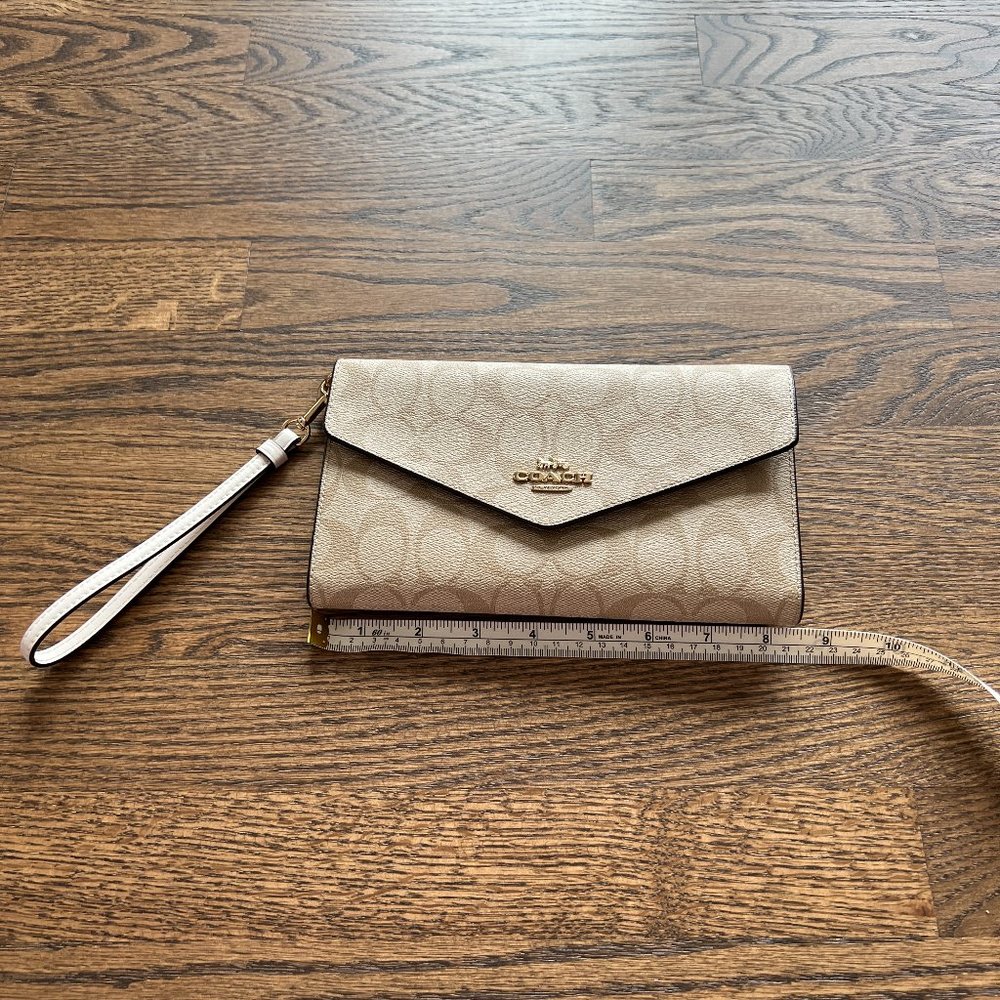 COACH beige C pattern clutch/wristlet